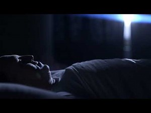 FREEDIO: "Sleeping man wakes up after alarm" royalty free HD stock video footage
