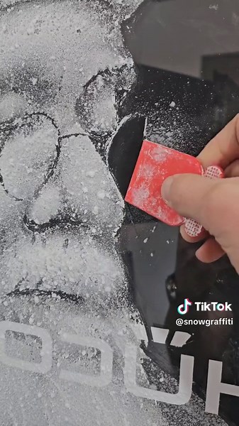 Spraying Santa with snow spray #christmas #christmasdecor #art #craft | christmas decorating