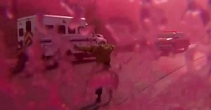 KNSD San Diego news crew reporting on a wildfire gets doused with fire retardant