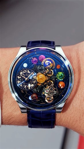 JACOB & CO. on Instagram: "Time, set in motion. The Astronomia Solar Zodiac transforms the dial into a private galaxy — gemstone planets drifting in harmony, a blazing sun suspended in space, and a sky shaped from stardust. Every ten minutes, the entire movement completes its orbit, turning mechanics into a spectacle. It’s not about measuring seconds. It’s about experiencing them — dimensional, radiant, alive. 44 mm white gold case Full movement rotation in 10 minutes Double-axis flying tourbill
