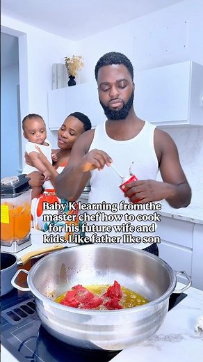 Baby K is learning from daddy