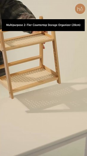 Multipurpose 2-Tier Countertop Storage Organizer (28cm) ✅ Add charm and function to your space with this compact and stylish 2-tier rack ✅ Handcrafted from natural wood with a breathable rattan-inspired shelf design ✅ Ideal for organizing fruits, skincare, or small décor in any room of your home Order Here  https://homeessentials.in/products/multipurpose-2-tier-countertop-storage-organizer-28cm | Shop Home Essentials | Facebook