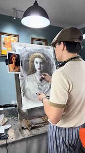 Fly Big's charcoal portrait demonstrates the methodical approach essential to developing strong representational skills. The studio setting and reference materials visible in the sequence show the disciplined practice required for mastering traditional drawing techniques, while the work-in-progress reveals careful attention to tonal relationships and facial structure. The artist's commitment to working from life and reference materials reflects serious engagement with foundational drawing princi