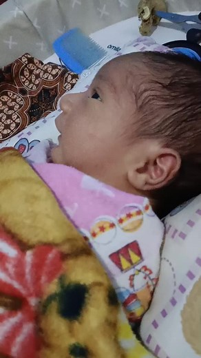 Senyum Bayi Baru Lahir yang Menghapus Segala Rasa Sakit