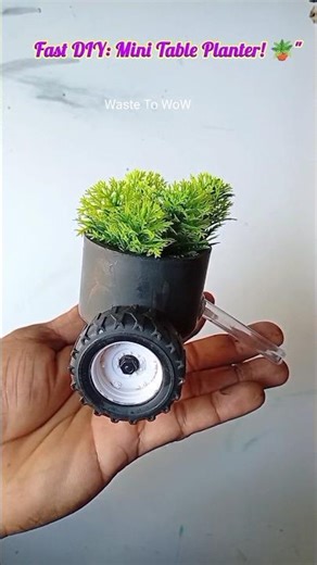 An Attractive Flower Pot made from a disposable cup and a toy wheel😯