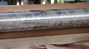 Bangalore, India 2nd February 2025: Indian Plywood Factory in Action: Male Workers Cutting, Sanding, and Pressing Wood Veneers, Operating Machinery, Glue Application, and Quality Inspection.