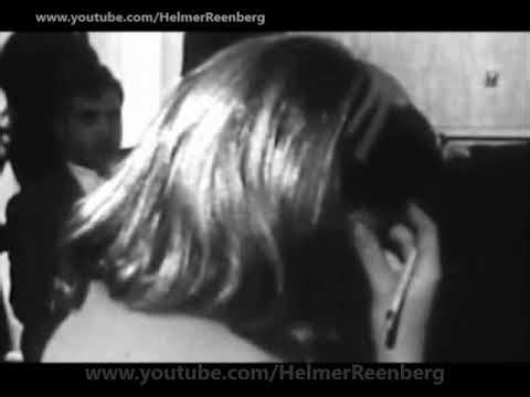 January 3, 1967 - Investigators and journalists listen to a recording from the trial of Jack Ruby