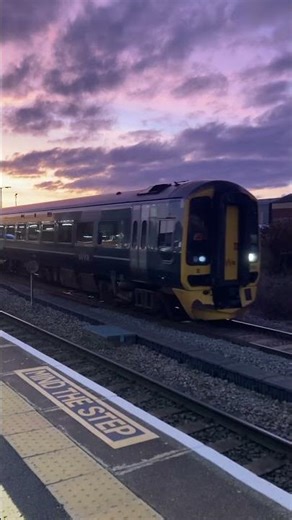 Class 158 departing westbury sidings with the beautiful sunset behind