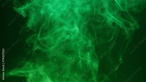Smoke texture on black background in green neon light. Smoking, steam clouds of vapour close-up. Burning, fog.