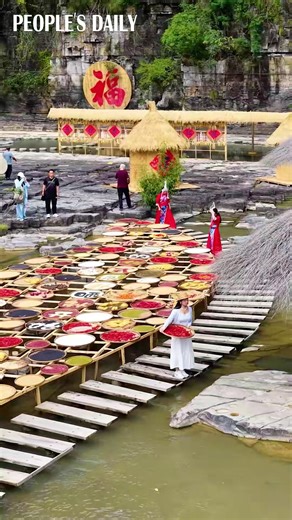 65K views · 4.6K reactions | Feel the charm of "Shaiqiu" — a rural autumn tradition of drying crops — in Wenzhou, east China’s Zhejiang Province, where villagers paint the fields with colors of gratitude and joy. | People's Daily, China | Facebook