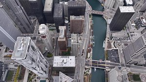 Aerial view of the streets and river of Downtown Chicago city from above. 2023
