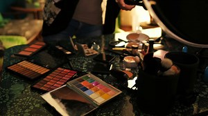 Female blogger arranging cosmetics on the table 4k | Premium Stock Video Footage