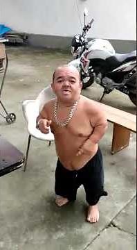 drunk latino dwarf singing and dancing