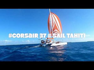 Corsair 37 spinnaker sailing in an atoll