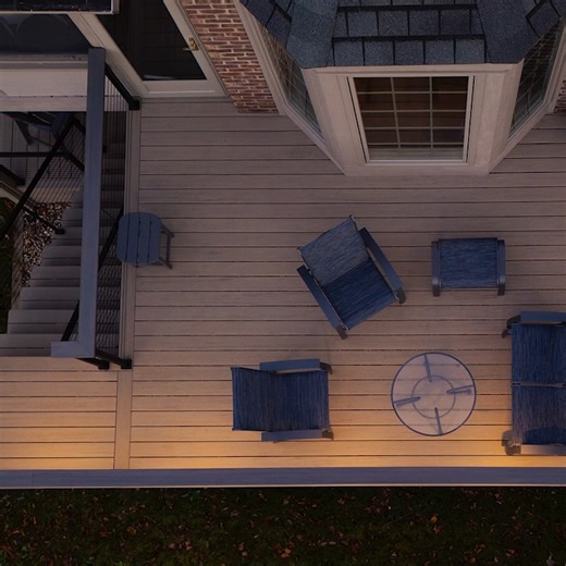 Outdoor lighting: the key to making your space feel as cozy as it looks. Decking: Reserve Collection - Reclaimed Chestnut (Main Deck), Landmark Collection - Castle Gate (Accent Color) 📸: Decks on Point | TimberTech