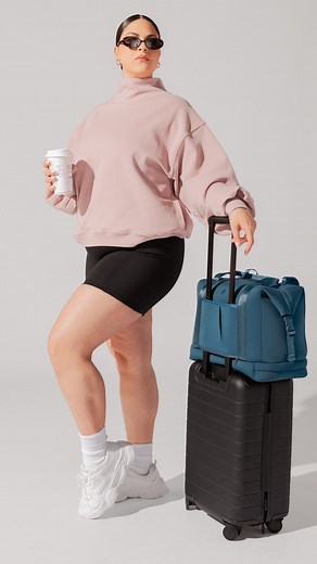 84K views · 348 reactions | Fumbling your luggage is officially off the itinerary. Meet the all-NEW Ella Duffle (Travel Edition) ✈️ With the features you love that make her your can’t-leave-the-house-without-it accessory but added one new addition: a LUGGAGE SLEEVE. She’s basically your BFFF now (best friend for flights). | POPFLEX Active | Facebook