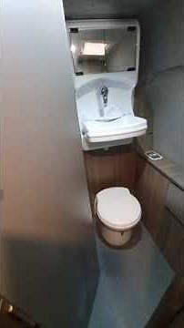 Transit Custom LWB campervan with toilet room and seating for 4.
