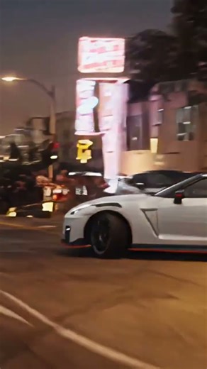 when 2 Nisan GTR racing