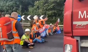 Arrest them! Climate activists shut down M25 – air ambulance called