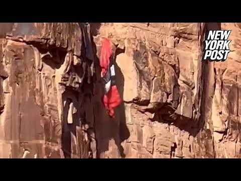 Video captures BASE jumper slam into Utah cliff, dangle above ground | New York Post