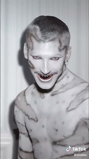 Human Snake Eats Cat.