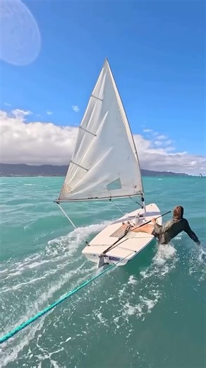 PredictWind on Instagram: "Who knew the world’s most serious little dinghy doubled as a towboat?? One Laser, two happy humans 👌🏼@gabriella_da_bella"