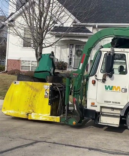 Garbage Truck dumping a cart