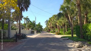 Driving on Casey Key scenic road in Florida.