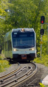 8.9K views · 321 reactions | A Camden-bound NJ Transit RiverLINE train rounds a curve, crosses the Assiscunk Creek and continues down the center of East Broad Street as it arrives in downtown Burlington, New Jersey. This unique diesel light rail system connects the state capital of Trenton with Camden to the south, stopping at many intermediate towns along the way. | Trainiac Productions | Facebook