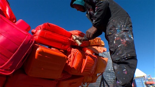 New sculpture made from luggage being installed at DIA