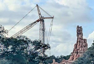 Large Crane Visible Behind Big Thunder Mountain Railroad at Walt Disney World | Chip and Company