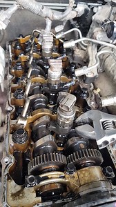 3 injectors for the price of 4 probably wasnt the value this customer expected when he had the injectors done a while ago. After whipping the cover off the engine we started smelling a rat. The rat being nuber 1 injector was seized into the cylider head and impossible to move. The other 3 were pretty easy and came out. Number 1 was interestingly different looking to the other 3. One guess. The last shop left 'seized in the head' number 1 injector and just changed the other 3. Once removed (see e