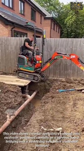 Operating a Mini Excavator to Dig a Utility Trench Beside a New-Build House