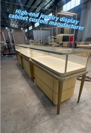 Introducing our latest custom jewelry display cabinet — where classic sophistication meets modern craftsmanship. The base cabinet is expertly crafted from wood-veneer with a high-gloss baked finish, offering a warm and luxurious texture that beautifully complements fine jewelry. Combined with ultra-clear tempered glass and refined detailing, this piece is designed to elevate any luxury retail environment. #CustomJewelryDisplayCases #LuxuryShowcaseDesign #PremiumGlassDisplayCabinets#BespokeJewelr