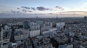 Aerial Paris: A dance of historic landmarks and bustling business sectors.