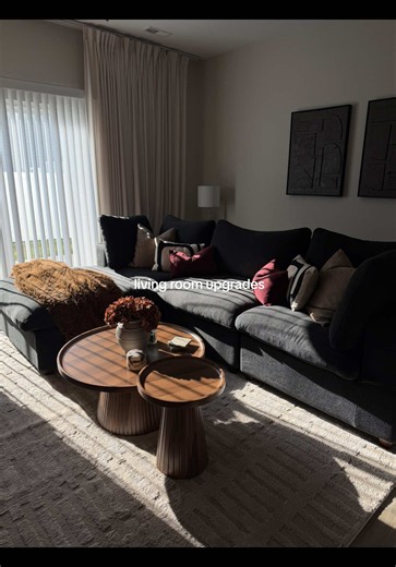 Refresh my living room with me 🤎 I had my old rug for sooo long literally years lol it was time for a change. Coffee table, rug, & wall art is from @Wayfair Wall Sconces are from @Amazon Home Everything is linked in my b i o #decoratewithme #livingroomdecor #homedecor #cozyathome