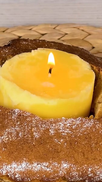 Dipping bread into a butter candle 🤤