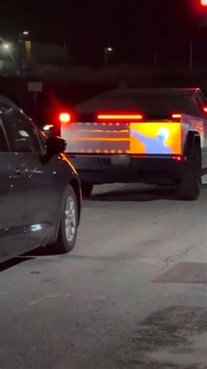 Someone keeps following me around town and is projecting this image on my Cybertruck. I did not consent to this. Will be calling the cops and reporting them for targeted harassment. | Tesla Cybertruck