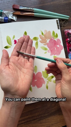 Painting a watercolor floral heart-shaped wreath