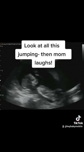14 weeks pregnant ultrasound of Baby jumping, and mom laughing