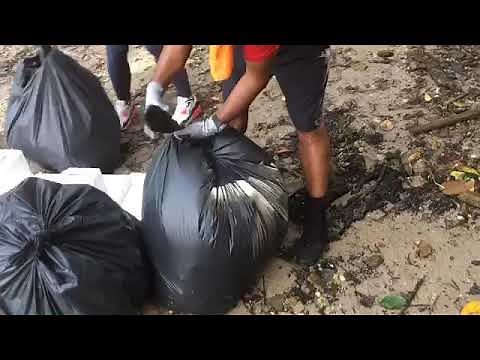 How to tie a trash bag for weighing and secure transfer during coastal cleanups