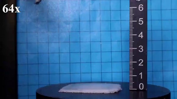 Polyurethane with shape memory change from foil to foam when heated