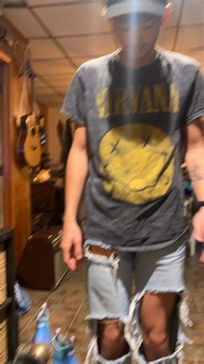 Transforming rock tee to tank #sniptease #cutshirt #nirvana #thriftflip #customclothing #scissors #artistsoftiktok #diyfashionhacks | T-Shirt Upcycle Diy