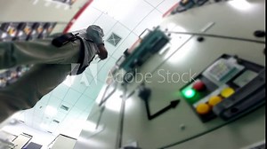 Engineer to check electrical control cabinet in substation building