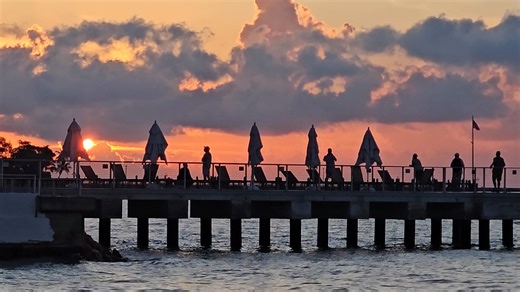 This Morning in Key West... The sky caught fire at dawn. Southernmost Beach Resort. 6:15 AM. While Duval Street sleeps off last night... A handful of us stand in silence. Watching clouds turn electric. No crowds. No noise. No admission fee. Just raw island magic reserved for early risers. This is the Key West most visitors never see. The one that makes you question why you'd ever leave. #KeyWestMagic #SouthernmostBeach #SunriseChaser #MorningGlow #FloridaKeys | Florida Keys Resorts