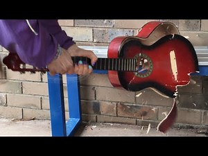 Angry Musician Destroys Guitar