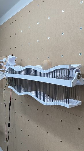 79K views · 97 reactions | Rube Goldberg Machine ep. 3 ••• The next module is up and running and its a cam driven wave generator. The 15 degree offset of the cams produces a digital wave that can push the ball along. The module is activated when the arm from the previous module hits a switch turning the motor on and producing the wave. ••• #sinewave #engineering #ballmachine #marblemachines #mechanicalengineering #mechatronics #kineticart #kineticsculpture | Engineezy | Facebook