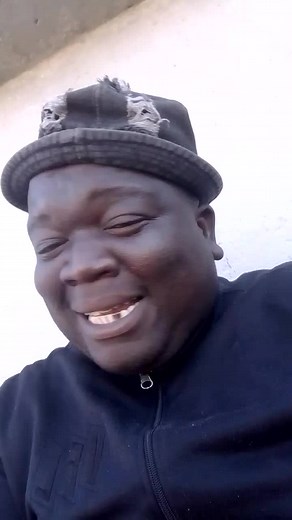 Exploring Fashion: Dark Jacket and Textured Hat Styles