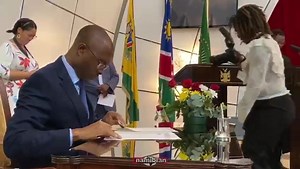 INCOMING ... New finance minister Ipumbu Shiimi signing his ministerial affirmation letter today at State House. Video: Shinovene Immanuel | The Namibian
