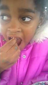 I let My 6 year old pull out her loose tooth.